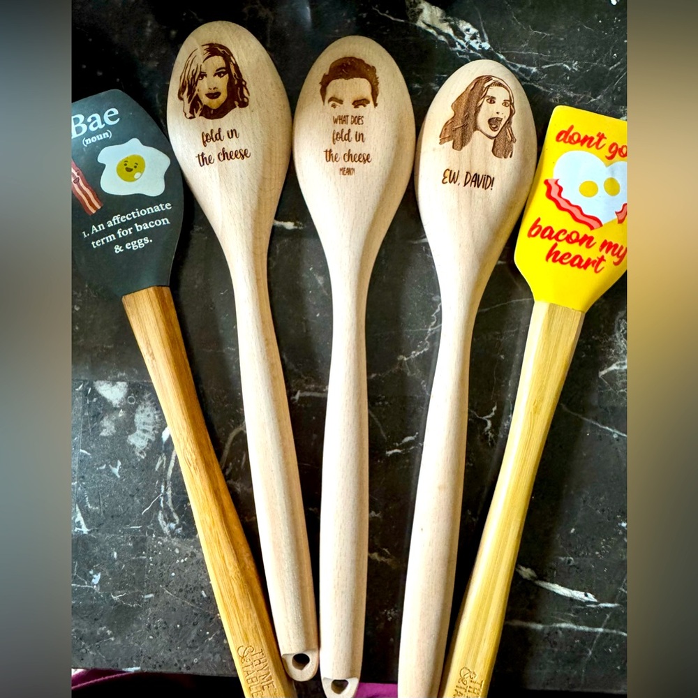 Cute kitchen wooden spoons and two spatulas